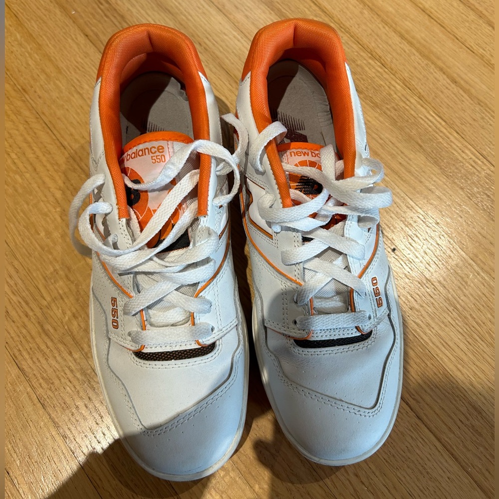 New Balance 550s in white and orange